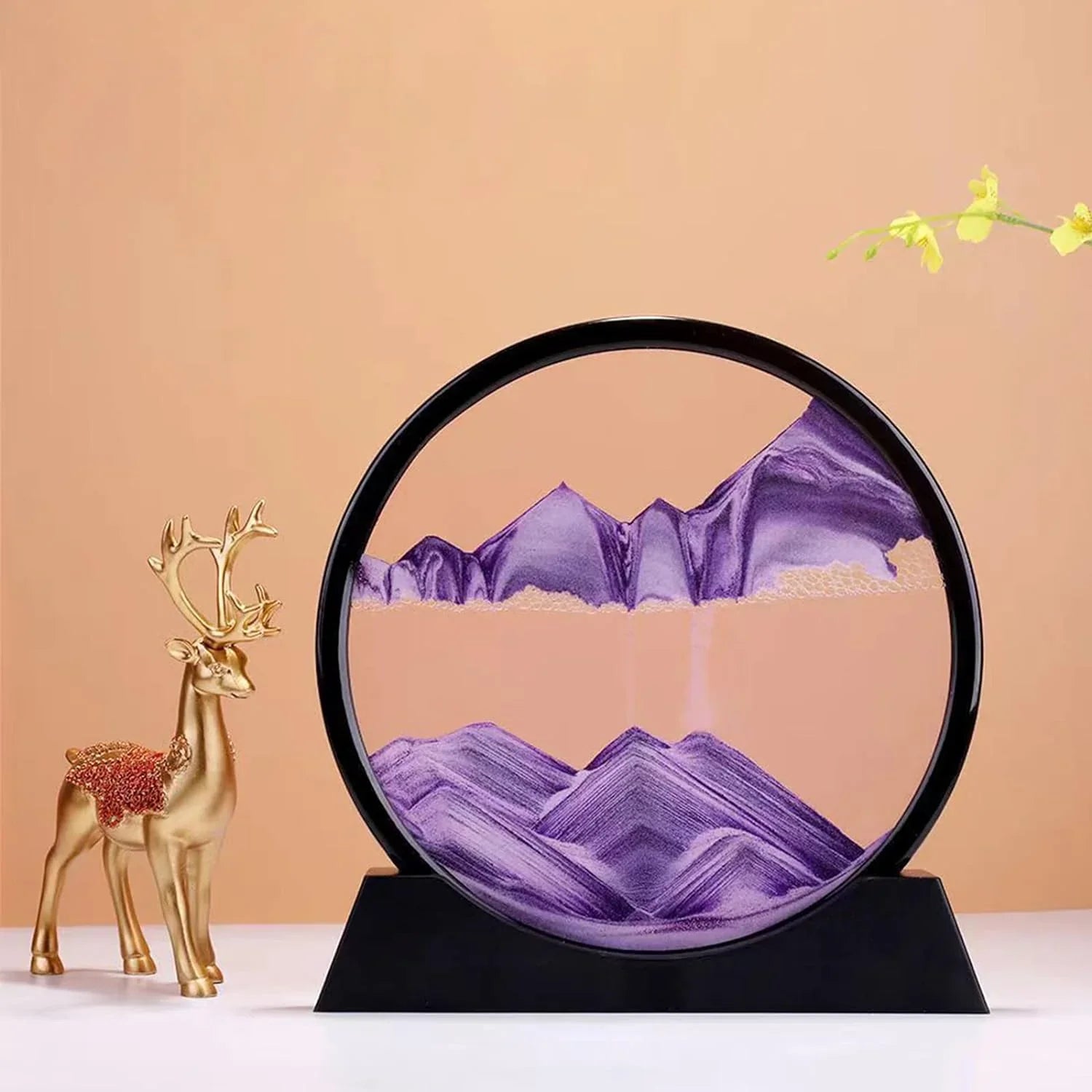 Purple sand art mountain landscape in circular frame with golden deer figurine, home decor accent piece