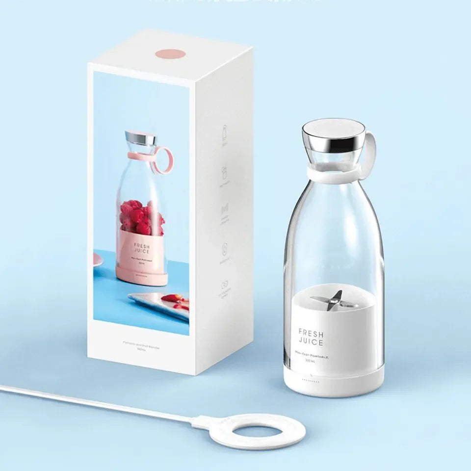 Portable mini blender for fresh juice, compact design with USB charging, ideal for smoothies on the go