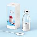 Portable mini blender for fresh juice, compact design with USB charging, ideal for smoothies on the go